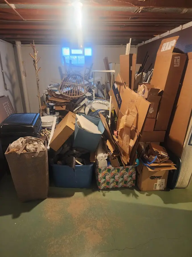 Roll-off dumpster container at job site for Yard Waste Dumpster Rental in Old Town